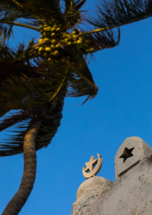 Star and moon on the roof of a mosque, Lamu county, Lamu town, Kenya