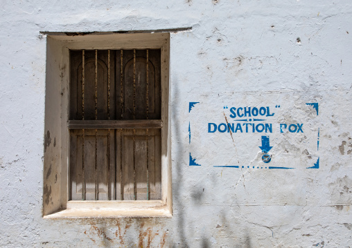 Donation box on a wall for an islamic school, Lamu county, Lamu town, Kenya