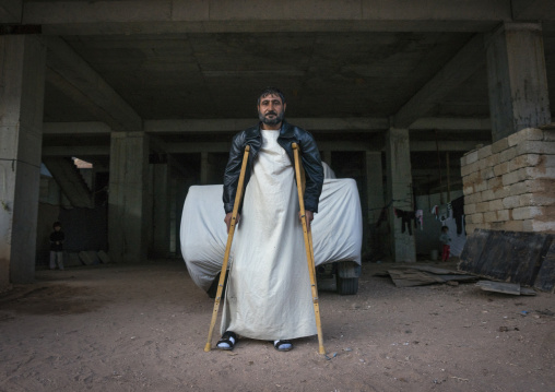 Wounded Yazidi Refugee From Sinjar Living In An Under Construction Building, Duhok, Kurdistan, Iraq