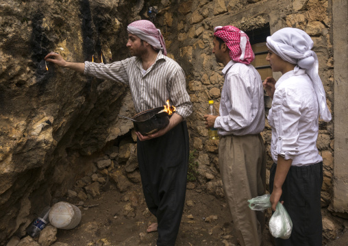 Yezedi Fakirs Lighting Sacred Fire In The Streets,  In Lalesh Temple, Kurdistan, Iraq