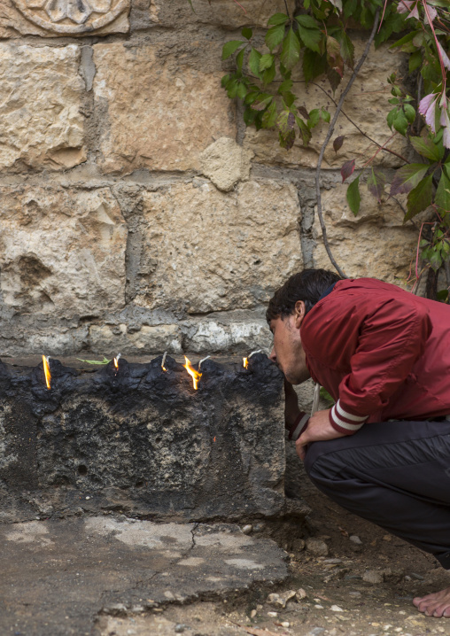 Yezedi Man Kissing The Sacred Fire, Lalesh Temple, Kurdistan, Iraq