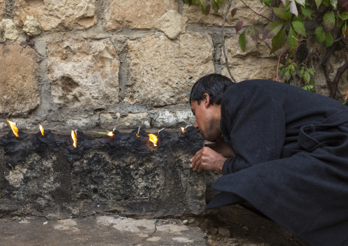 Yezedi Man Kissing The Sacred Fire, Lalesh Temple, Kurdistan, Iraq