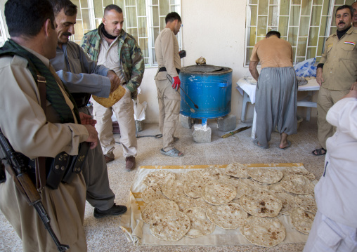 Kurdish Peshmergas On The Frontline In A Kitchen, Kirkuk, Kurdistan, Iraq