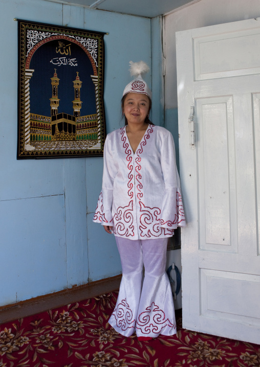 Woman Wearing Traditional Clothes And Headgear, Village Of Kyzart, Kyrgyzstan