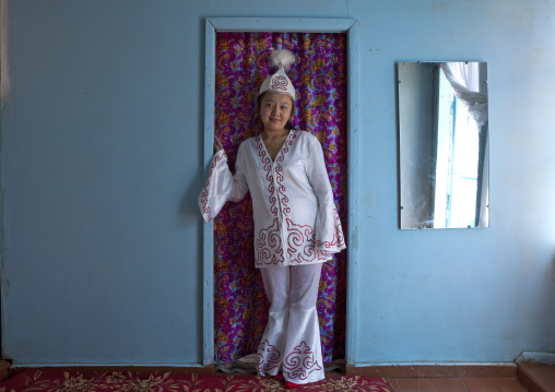 Woman Wearing Traditional Clothes And Headgear, Village Of Kyzart, Kyrgyzstan