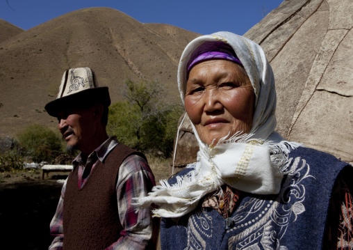 Old Couple In Front Of Their Yurt Near Kyzart River, Kyrgyzstan