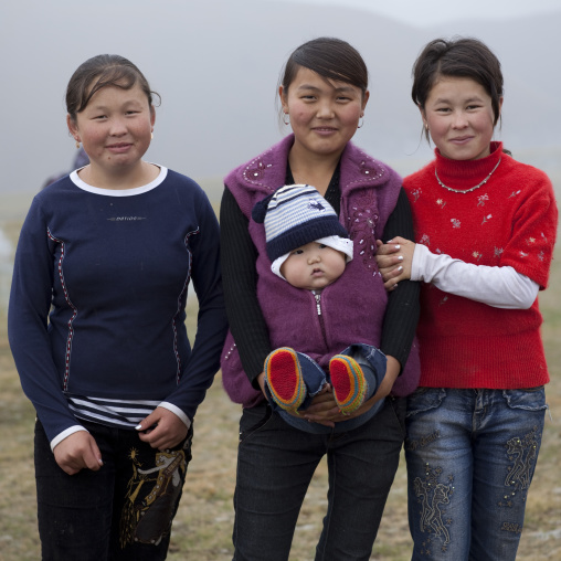 Women And Baby In Saralasaz Jailoo, Kyrgyzstan