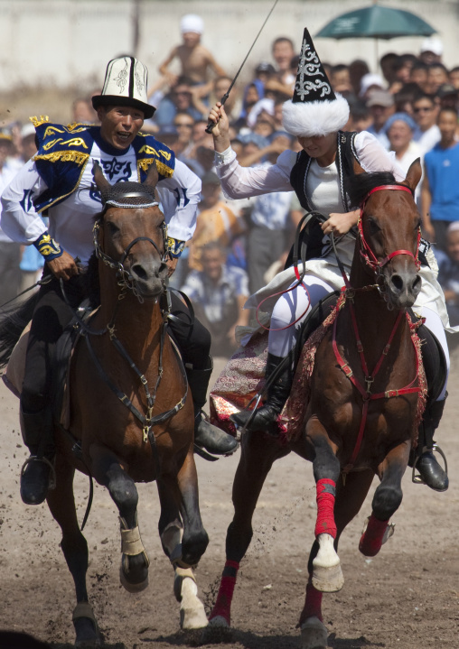 Man And Woman Playing A Horse Game On National Day, Bishkek, Kyrgyzstan