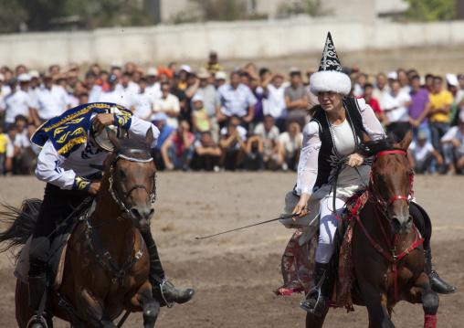 Man And Woman Playing A Horse Game On National Day, Bishkek, Kyrgyzstan