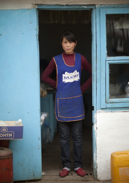 Woman With An Apron At The Entrance Of Her House, Kochkor, Kyrgyzstan