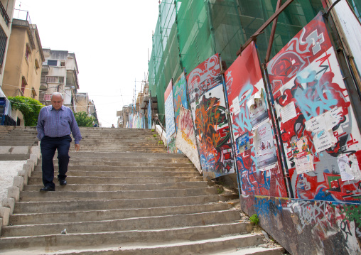 Old lebanese man going down stairs in mar mikhael, Beirut Governorate, Beirut, Lebanon