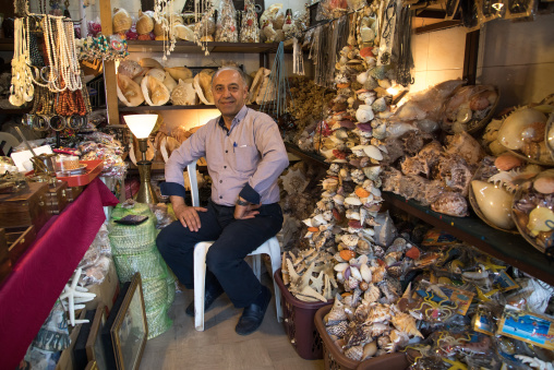 Lebanese man selling shells in a shop, North Governorate, Tripoli, Lebanon