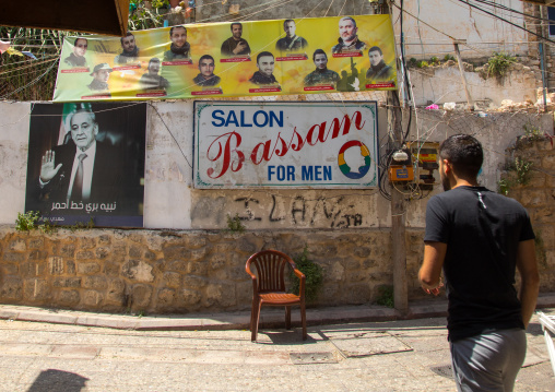 Hezbollah martyrs pictures on a wall, South Governorate, Tyre, Lebanon