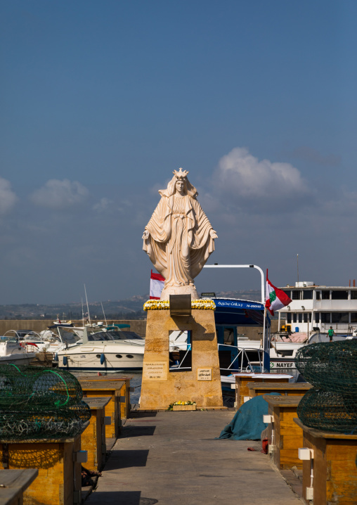 A statue of the virgin Mary sits in the fishing port, South Governorate, Tyre, Lebanon