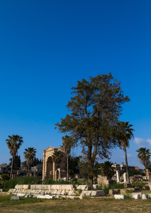 Roman triumphal arch and colonnaded street in al Bass site, South Governorate, Tyre, Lebanon