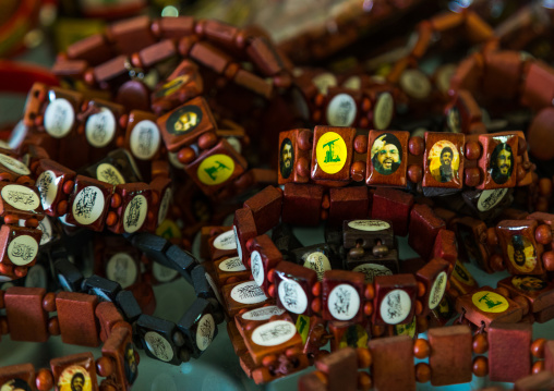 Sheikh Hassan Nasrallah necklaces in a hezbollah souvenirs shop in the tourist landmark of the resistance, South Governorate, Mleeta, Lebanon