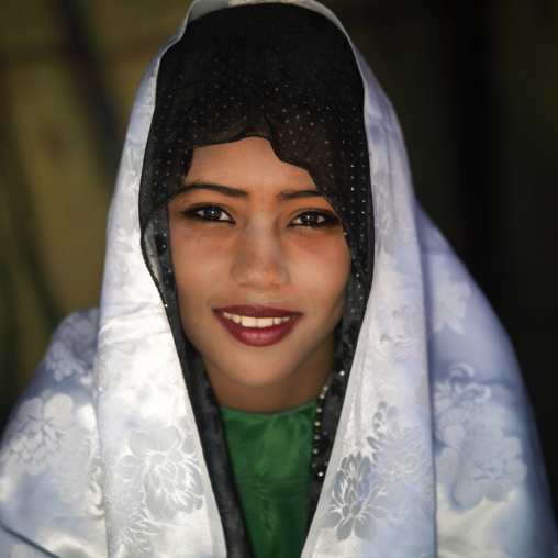 Smiling tuareg girl in traditionnal clothing, Tripolitania, Ghadames, Libya