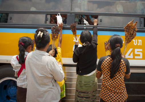 People selling chicken to tourists, Pakse, Laos