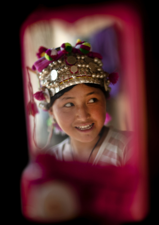 Akha minority woman with traditional headdress, Muang sing, Laos