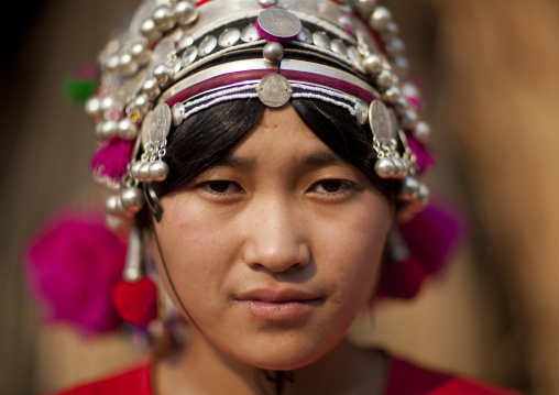 Akha minority woman with traditional headdress, Muang sing, Laos