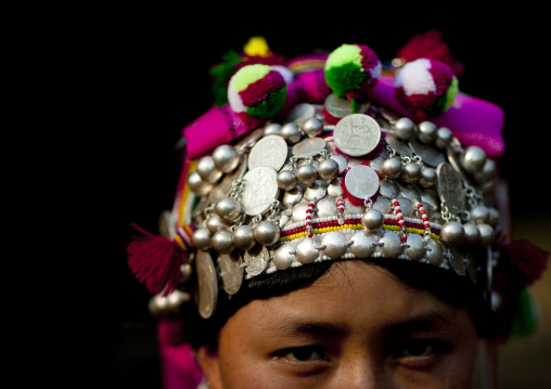 Akha minority woman with traditional headdress, Muang sing, Laos