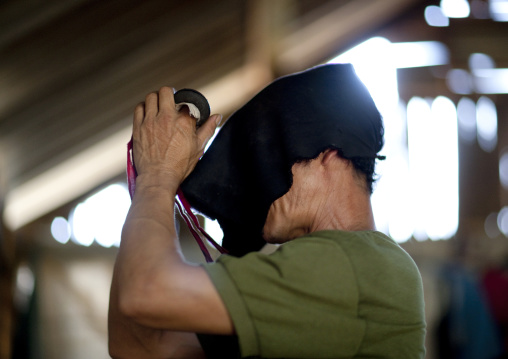 Hmong shaman during a ceremony, Muang sing, Laos