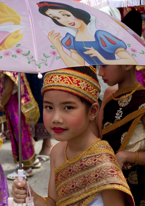 Girl in traditional clothing during pii mai lao new year celebration, Luang prabang, Laos