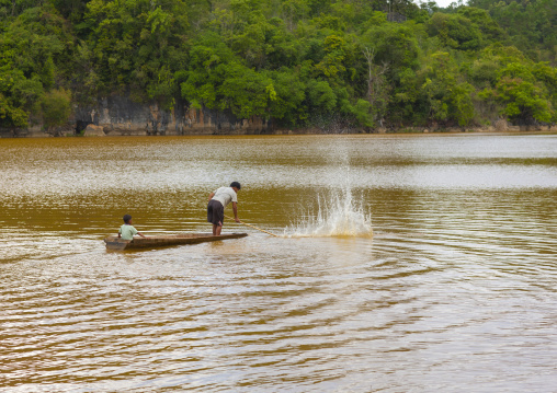 Fishermen on a boat, Phonsavan, Laos