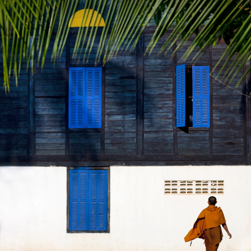 Monk in front of a monastery, Savannakhet, Laos