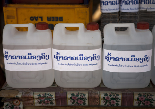 Alcool for sale in a market, Pakse, Laos