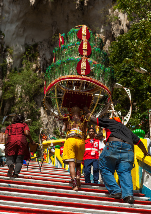 Devotee Kavadi Bearer Climbing Stairs At Thaipusam Hindu Religious Festival In Batu Caves, Southeast Asia, Kuala Lumpur, Malaysia