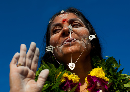 Hindu Devotee Woman With Pierced Tongue During Annual Thaipusam Religious Festival In Batu Caves, Southeast Asia, Kuala Lumpur, Malaysia