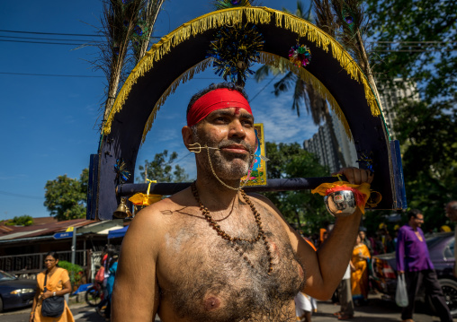 Devotee Kavadi Bearer With Tongue Piercing At Thaipusam Hindu Religious Festival In Batu Caves, Southeast Asia, Kuala Lumpur, Malaysia