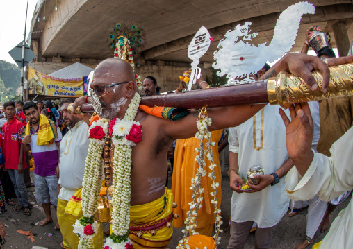 Hindu Devotee With A Metallic Mask In Annual Thaipusam Religious Festival In Batu Caves, Southeast Asia, Kuala Lumpur, Malaysia