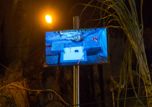 Television Screen Showing Sacred Place In Annual Thaipusam Religious Festival In Batu Caves, Southeast Asia, Kuala Lumpur, Malaysia