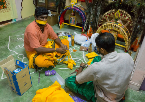 Hindu Devotee With His Mouth Gagged In Thaipusam Festival Preapring Offerings, Southeast Asia, Kuala Lumpur, Malaysia