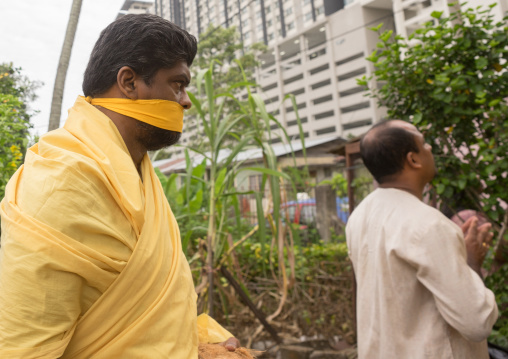 Hindu Devotee With Her Mouth Gagged To Keep Silence In Annual Thaipusam Religious Festival In Batu Caves, Southeast Asia, Kuala Lumpur, Malaysia