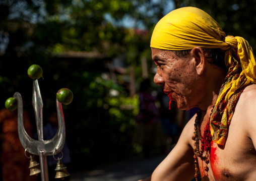 Hindu Devotee With Vishnu Trident In Annual Thaipusam Religious Festival In Batu Caves, Southeast Asia, Kuala Lumpur, Malaysia