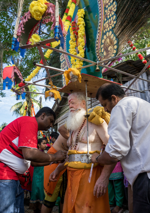 Devotee Kavadi Australian Bearer With Tongue Piercing At Thaipusam Hindu Religious Festival In Batu Caves, Southeast Asia, Kuala Lumpur, Malaysia