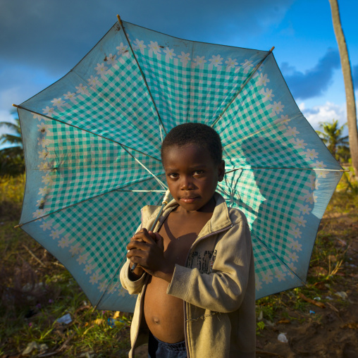 Boy With An Umbrella In The Country, Inhambane, Inhambane Province, Mozambique