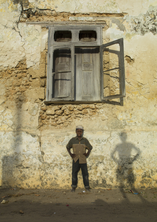 Kid Standing In Front Of An Old Window, Ibo Island, Cabo Delgado Province, Mozambique