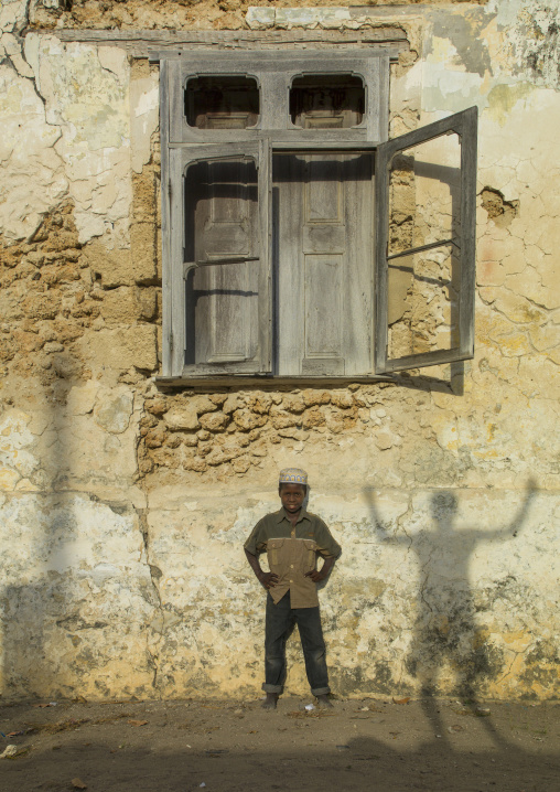 Kid Standing In Front Of An Old Window, Ibo Island, Cabo Delgado Province, Mozambique