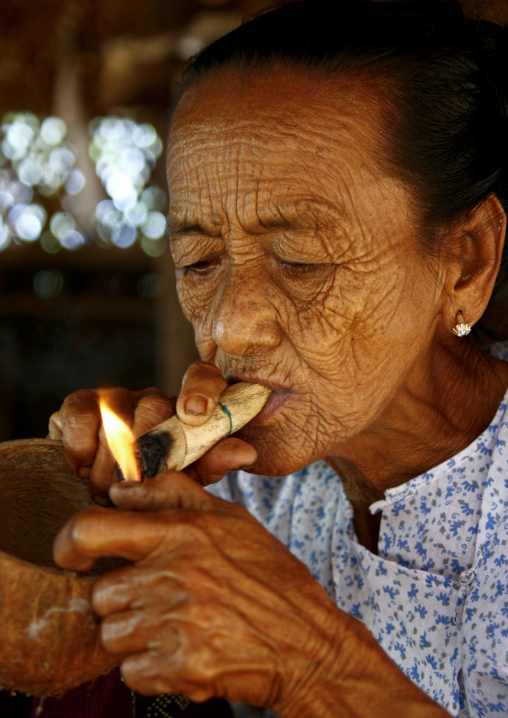 Elderly Woman Smoking Cigar, Bagan, Myanmar