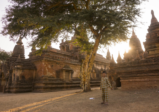 Young Boy In Front Of Old Temple, Bagan, Myanmar