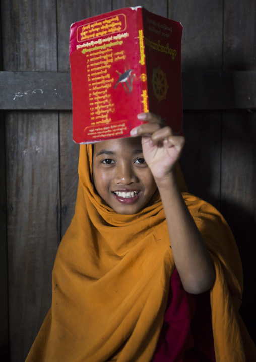 Young Novice Reading A Book, Mrauk U, Myanmar