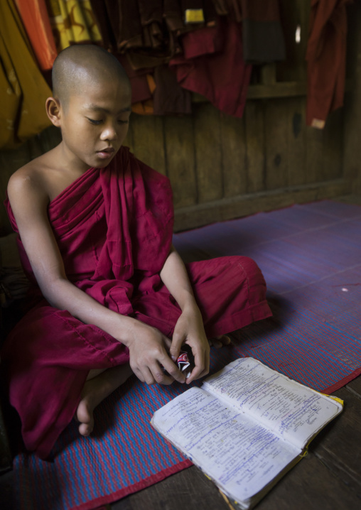 Young Novice Reading A Book, Mrauk U, Myanmar