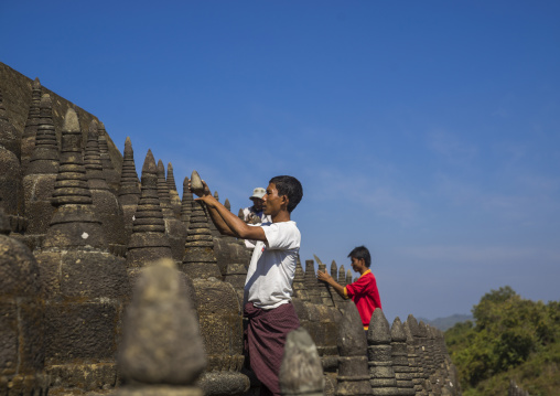 Men Restoring Stupas At Kothaung Temple, Mrauk U, Myanmar