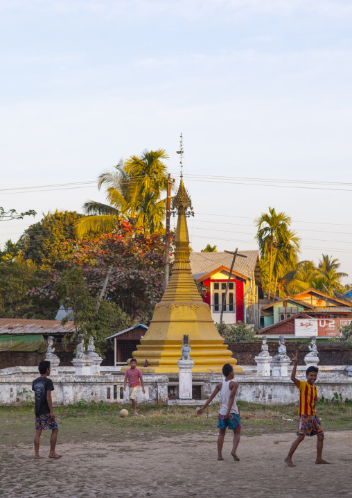 Teens Playing Football In A Monastery Courtyard, Sittwe, Myanmar