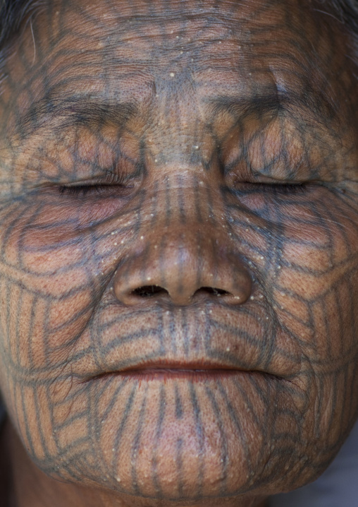 Tribal Chin Woman With Spiderweb Tattoo On The Face And Closed Eyes, Mrauk U, Myanmar