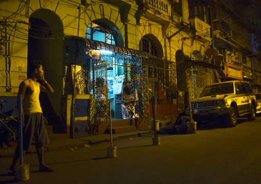 Man Calling On The Phone In The Old Colonial Dictrict, Yangon, Myanmar